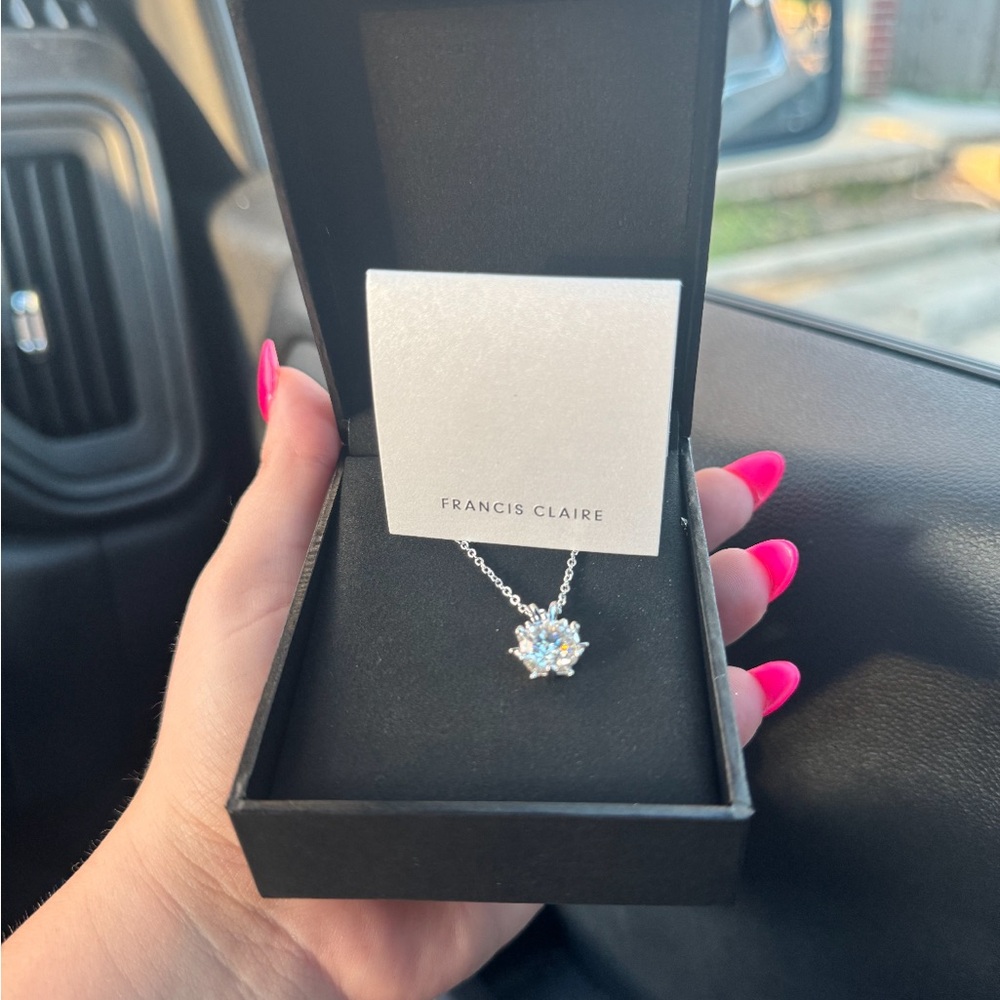 Silver Necklace with moissanite gemstone.